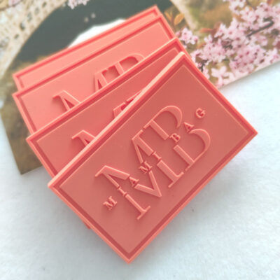 custom rubber patch for clothing with raised PVC logo